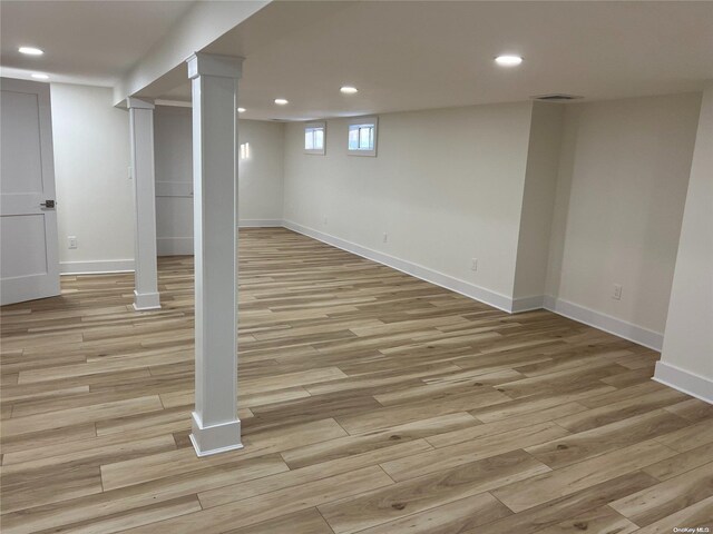 basement with light wood-type flooring