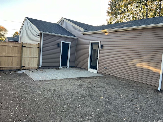 back of house with a patio area