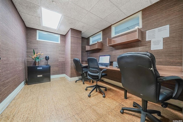 home office featuring a drop ceiling