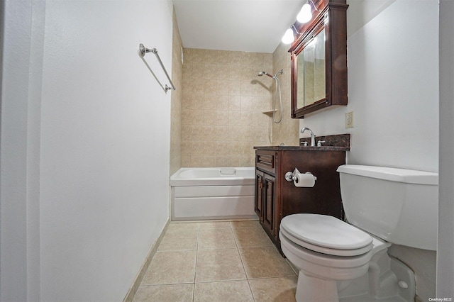 full bathroom featuring tile patterned floors, vanity, toilet, and tiled shower / bath combo