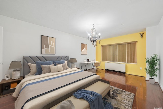 bedroom featuring a notable chandelier, dark hardwood / wood-style flooring, and radiator