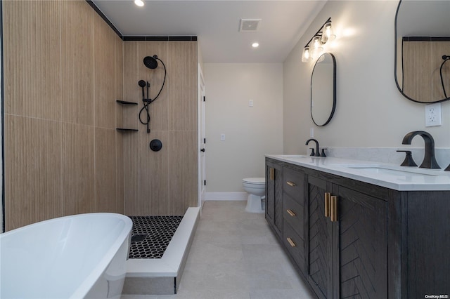 full bathroom featuring separate shower and tub, vanity, and toilet