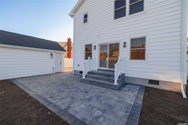 rear view of house featuring a patio