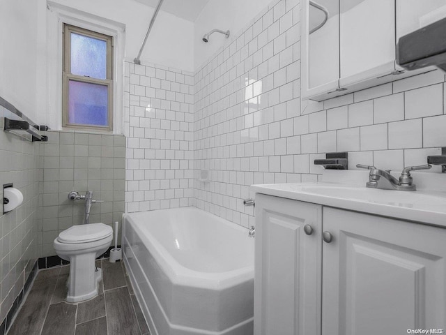 full bathroom with shower / tub combination, vanity, tile walls, and toilet