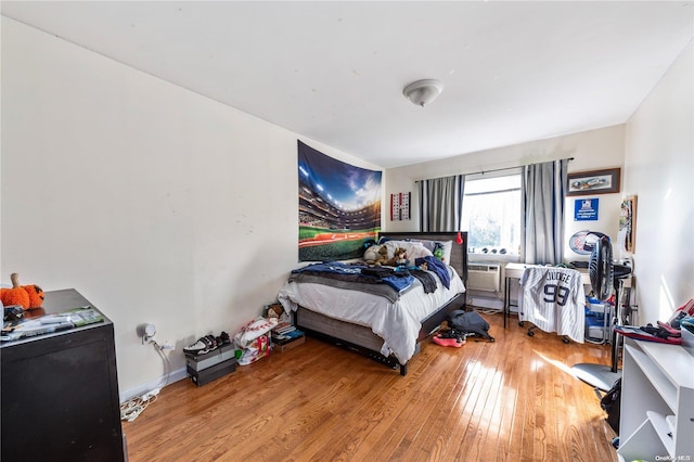 bedroom featuring hardwood / wood-style floors