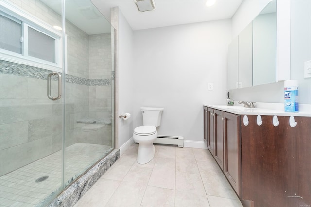 bathroom with toilet, vanity, a baseboard heating unit, tile patterned flooring, and a shower with door