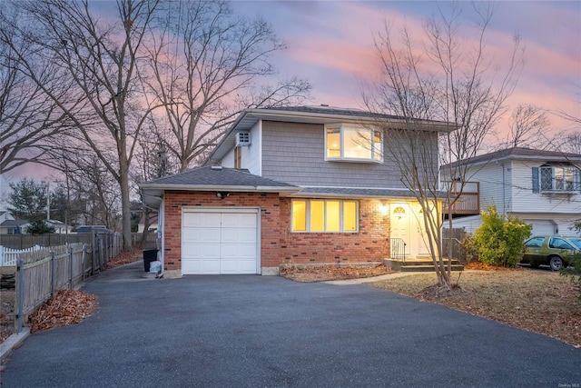 front of property with a garage