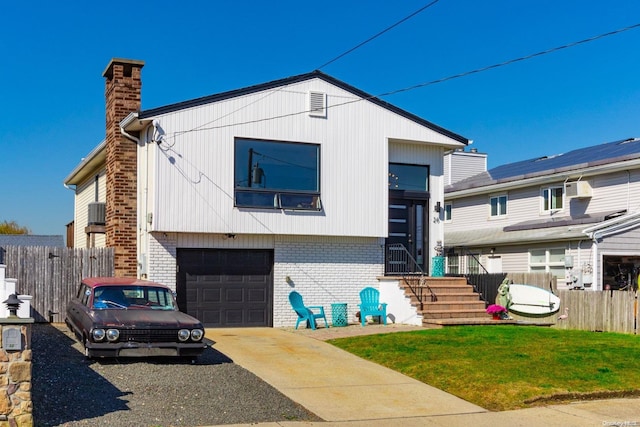 view of front of home featuring a garage