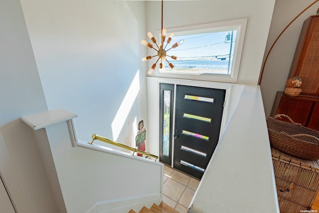 entrance foyer with light tile patterned flooring