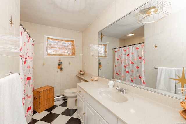 bathroom with curtained shower, a baseboard heating unit, toilet, vanity, and tile walls