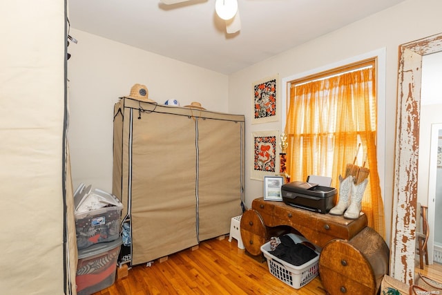 miscellaneous room featuring hardwood / wood-style floors and ceiling fan