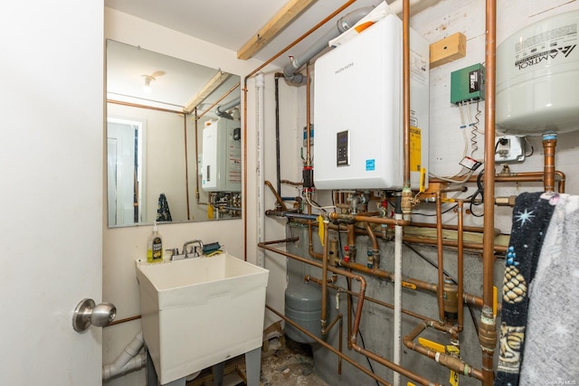 utilities featuring sink and water heater