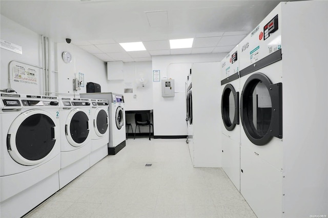 clothes washing area with separate washer and dryer and stacked washer / dryer