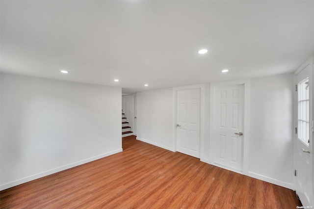 basement featuring light hardwood / wood-style flooring