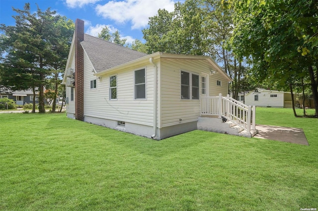 exterior space featuring a lawn