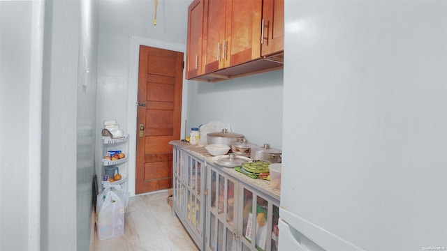 kitchen featuring white fridge