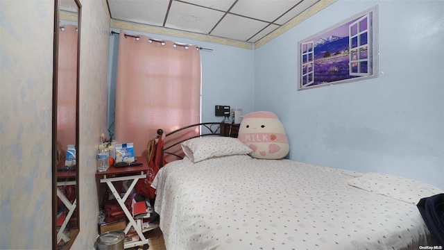 bedroom with a drop ceiling