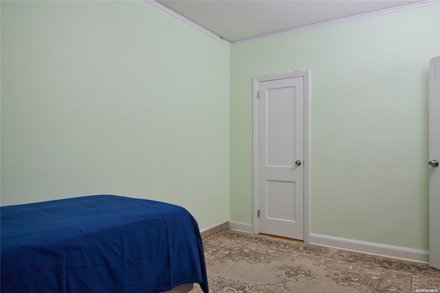 bedroom with crown molding