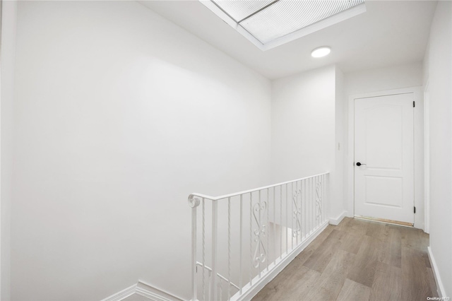 hallway featuring light hardwood / wood-style flooring