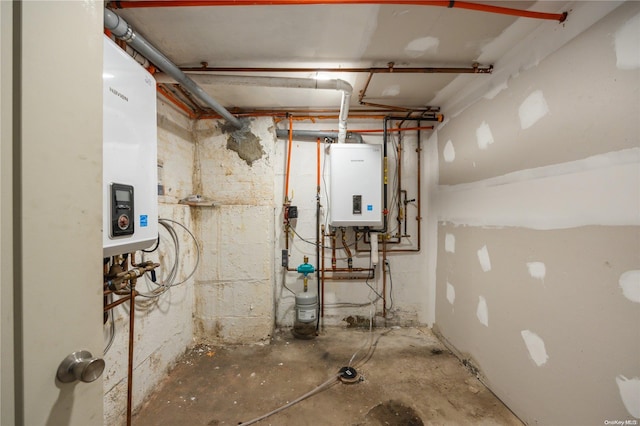 utility room with tankless water heater