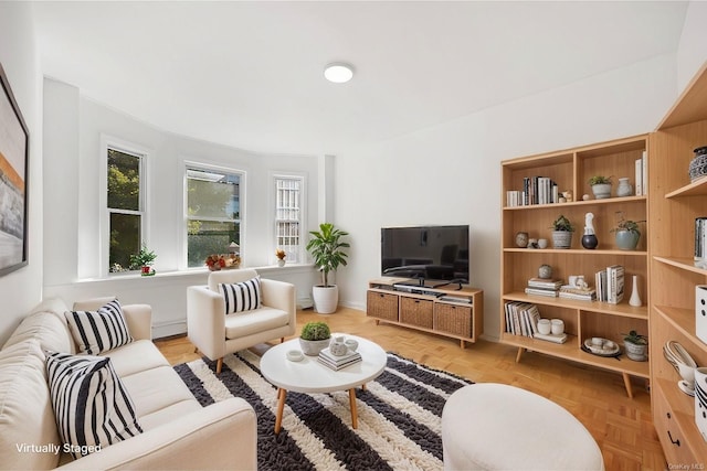 living room with light parquet flooring