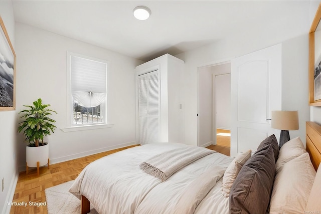 bedroom featuring light parquet floors