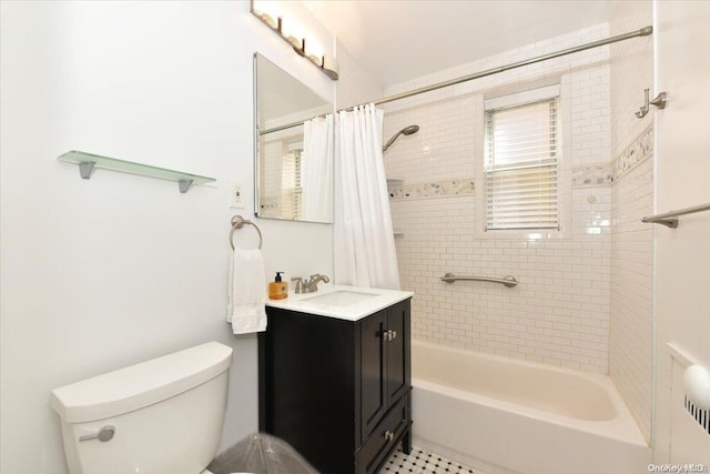 full bathroom featuring tile patterned floors, shower / tub combo with curtain, vanity, and toilet