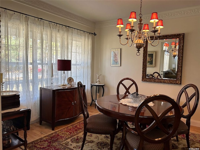 dining space featuring a chandelier and hardwood / wood-style flooring