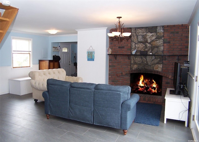 tiled living room with crown molding and a fireplace