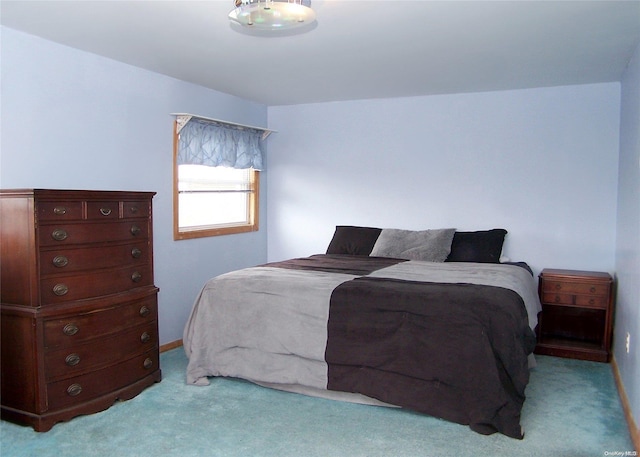 4 Quail Rd, Mastic Beach, NY 11951 - carpeted bedroom featuring baseboards