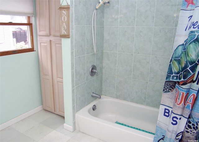 bathroom featuring shower / bathtub combination with curtain