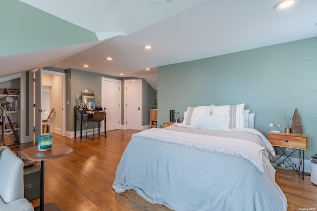 bedroom featuring wood-type flooring