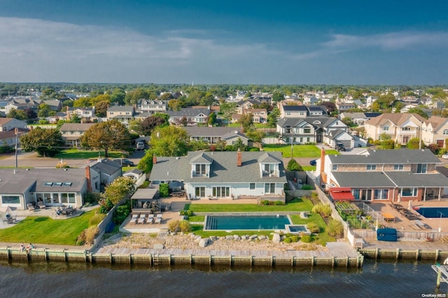 drone / aerial view featuring a water view