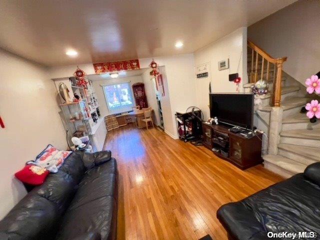 living room with hardwood / wood-style floors