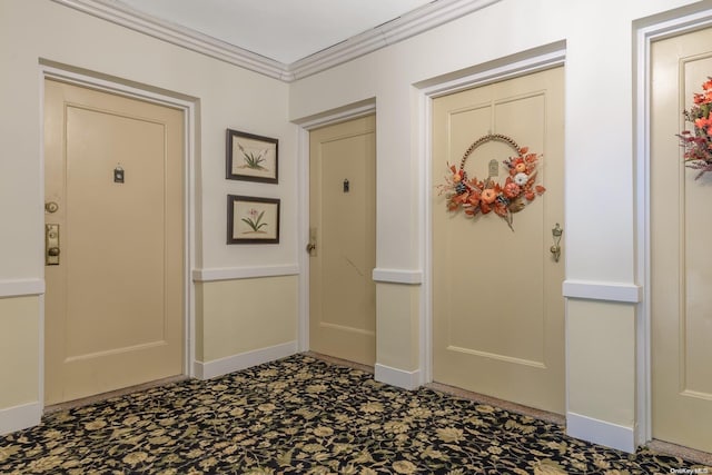 entryway with crown molding