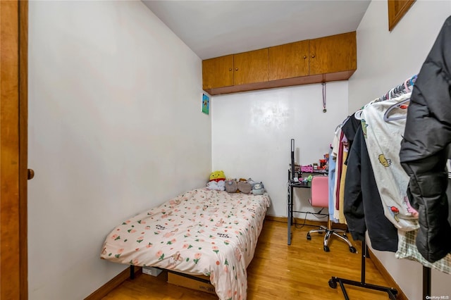 bedroom featuring light hardwood / wood-style floors