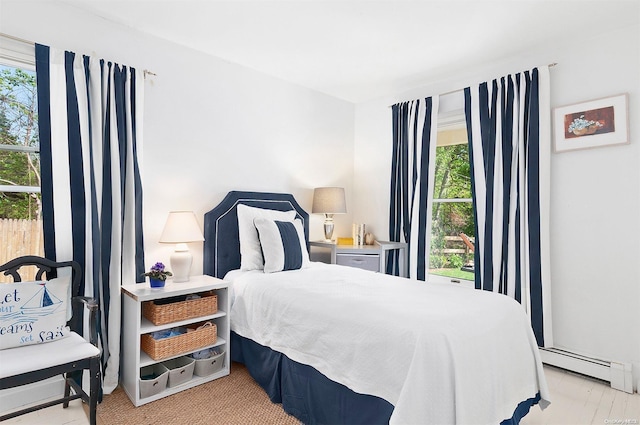 bedroom featuring a baseboard radiator