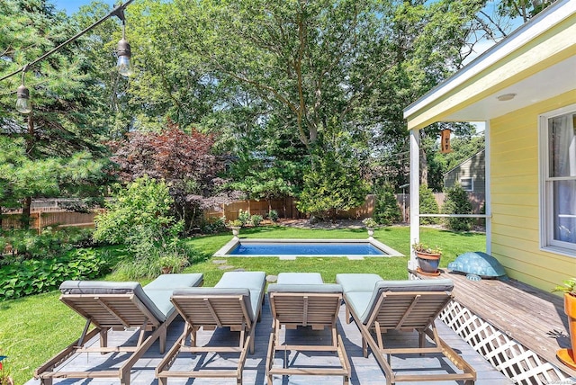 view of patio / terrace with an outdoor living space and a swimming pool side deck