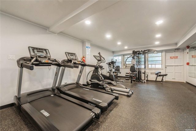 workout area with ornamental molding