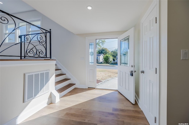 entrance foyer featuring light wood-type flooring