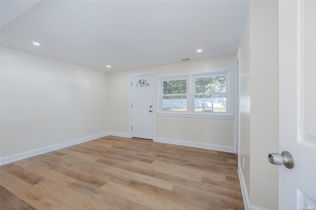 entrance foyer with light wood-type flooring