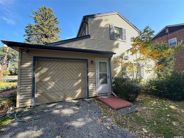 front facade with a garage