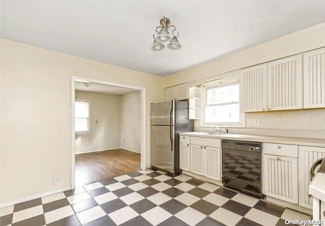 kitchen with dark hardwood / wood-style flooring, beverage cooler, stainless steel refrigerator, and a wealth of natural light