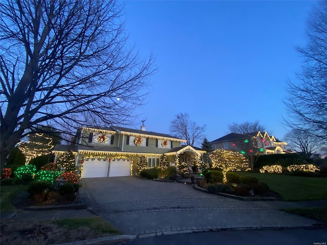 view of front of home featuring a garage