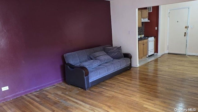 living room with dark wood-type flooring