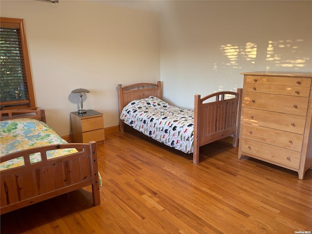 bedroom featuring light hardwood / wood-style floors