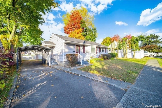 view of front of house with a carport