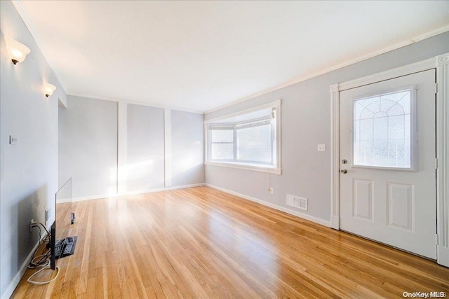 foyer with light hardwood / wood-style floors