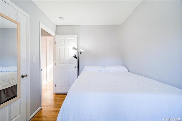 bedroom featuring light hardwood / wood-style floors