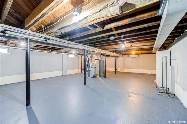 basement featuring heating unit